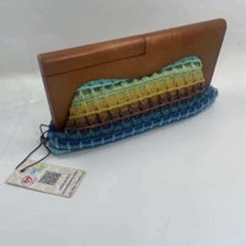Urban Expressions vibrantly colored clutch bag